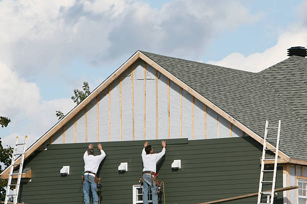Professional Emergency Siding Repair technician working in Westbury, NY